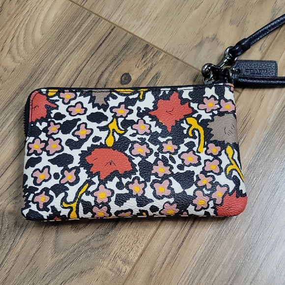 Coach Handbags - Coach Small Wristlet In Mixed Yankee Floral Print Coated Canvas